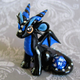 Illustration for article titled Adorable sculpted dragons guard your 20-sided dice